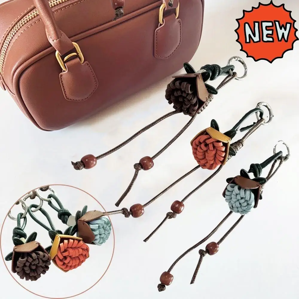 اليدوية زهرة شرابة الكرة حقيبة سحر الجلود زهرة حبل مضفر أكياس قلادة المفاتيح سيارة قلادة الديكور حقيبة الملحقات