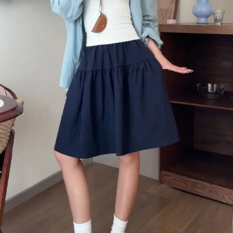 College Style Loose A Line Skirts Women 2026 Summer Elastic High Waist Pleated Skirts Woman Japanese Solid Knee-Length Skirt