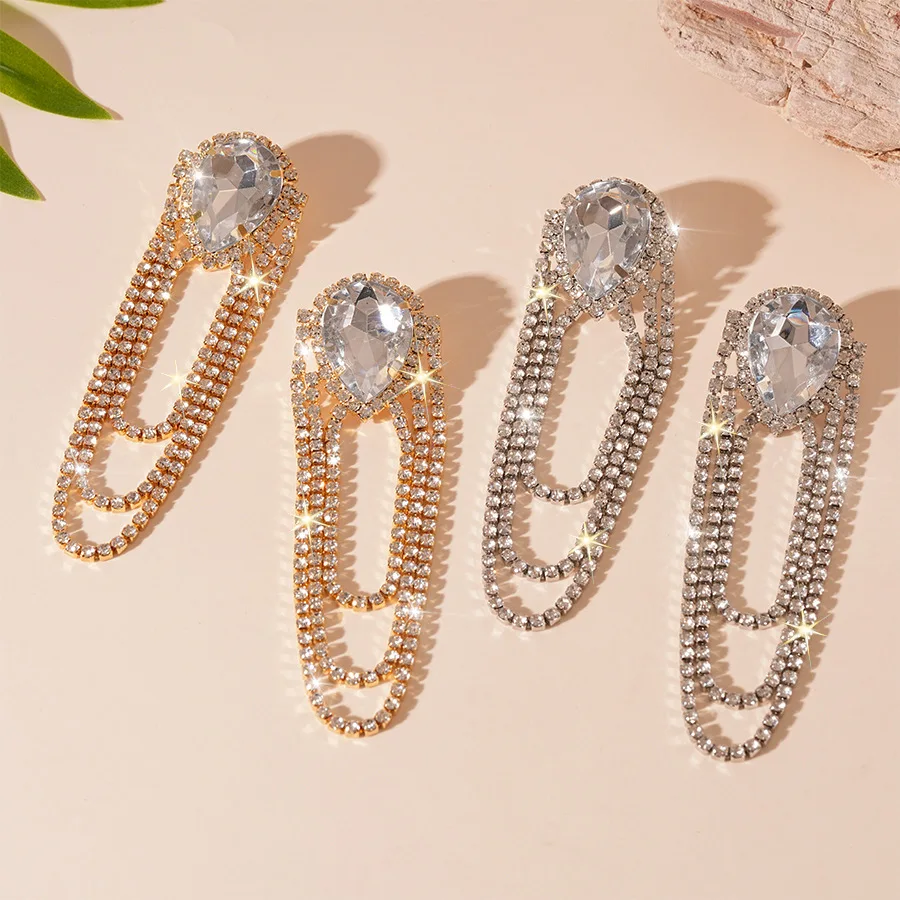 Super flash light luxury style diamond-encrusted water drop fringed silver needle earrings, niche temperament elegant