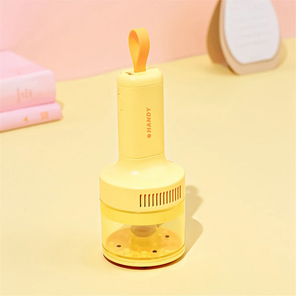 Aspirapolvere da tavolo per uso domestico e in auto, forte aspirazione, ricarica USB, mini pulitore per tastiera giallo