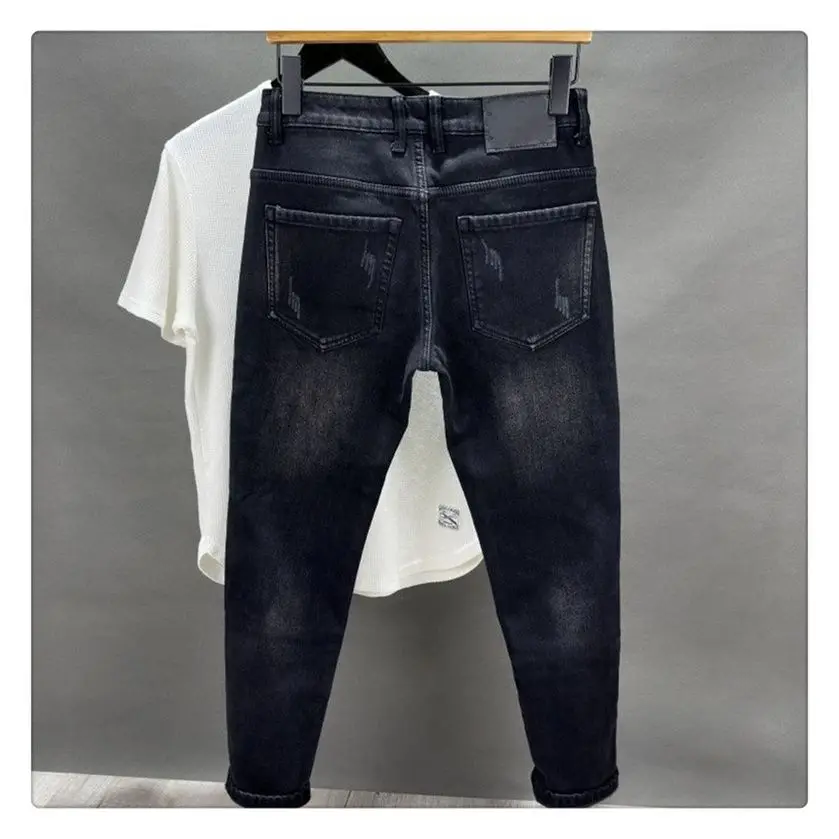 Pantalones vaqueros bordados de alta gama para hombre, pantalones bordados con patrón de marca a la moda para hombre, nuevos pantalones ajustados versátiles de moda para otoño e invierno