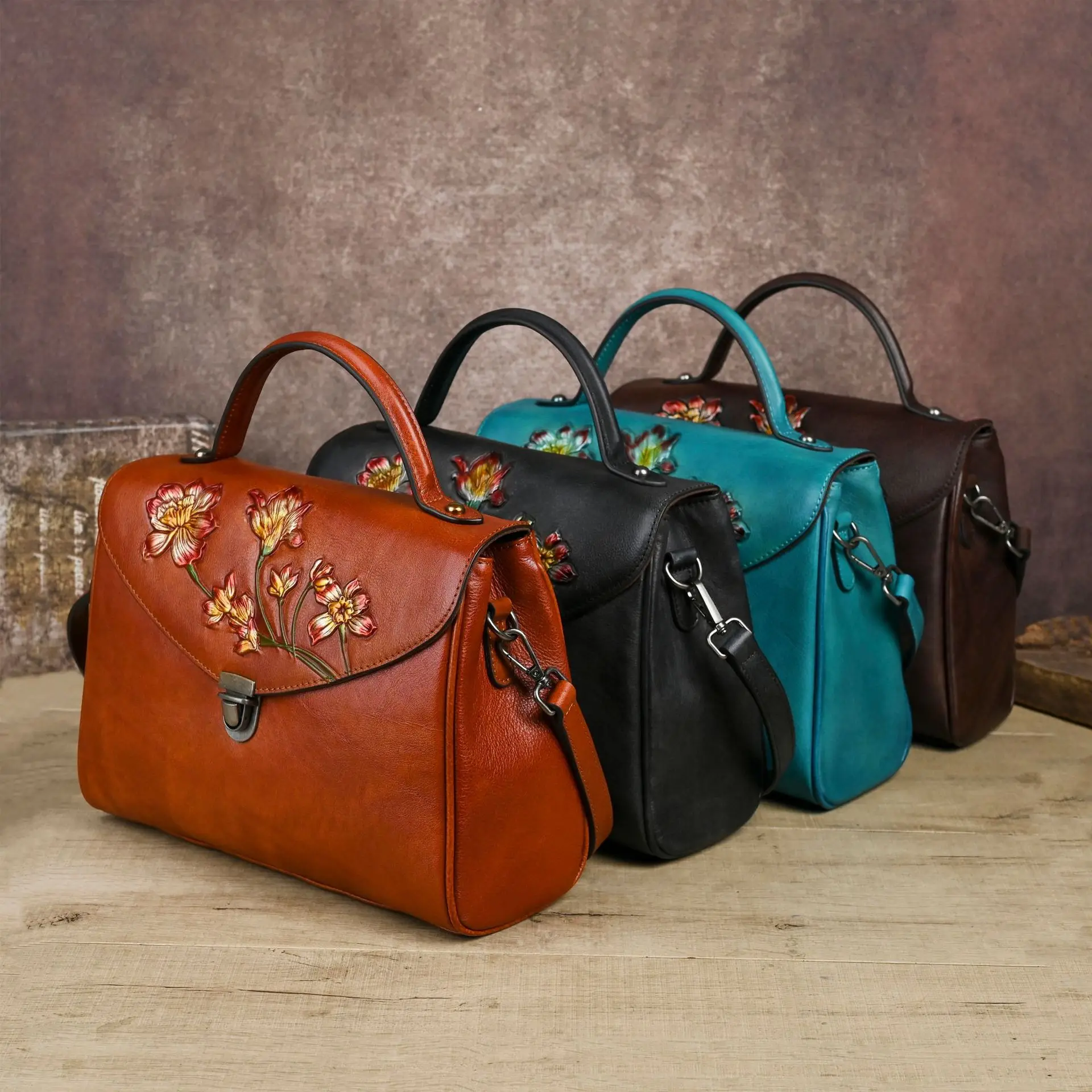Real leather Chinese style ladies retro embosed Clamshell latch ladies large capacity hand carry shoulder crossbody bag