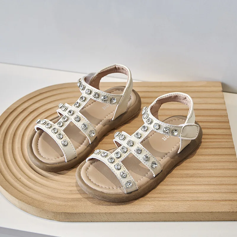 Kinderen Retro Romeinse Sandalen 2024 Gloednieuwe Koreaanse Comfortabele Zachte Zool Meisjes 'Mode Strass Strandschoenen Kinderen Zomer Flats