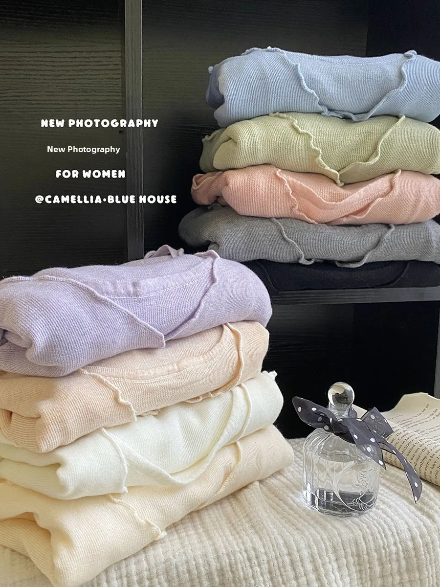 كارديجان نسائي رقيق بأكمام طويلة وتصميم أنيق، قطعة علوية كاجوال بلون واحد وتصميم يشبه الأذن، إطلالة من قطعتين لفصل الربيع