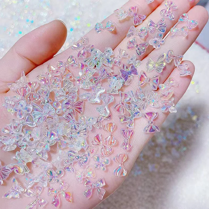 50Pcs Aurora Bowknot Nail art Dekoration 3D Glitter Charms Transluzente Gelee Bogen Strass DIY Maniküre Werkzeuge Teile