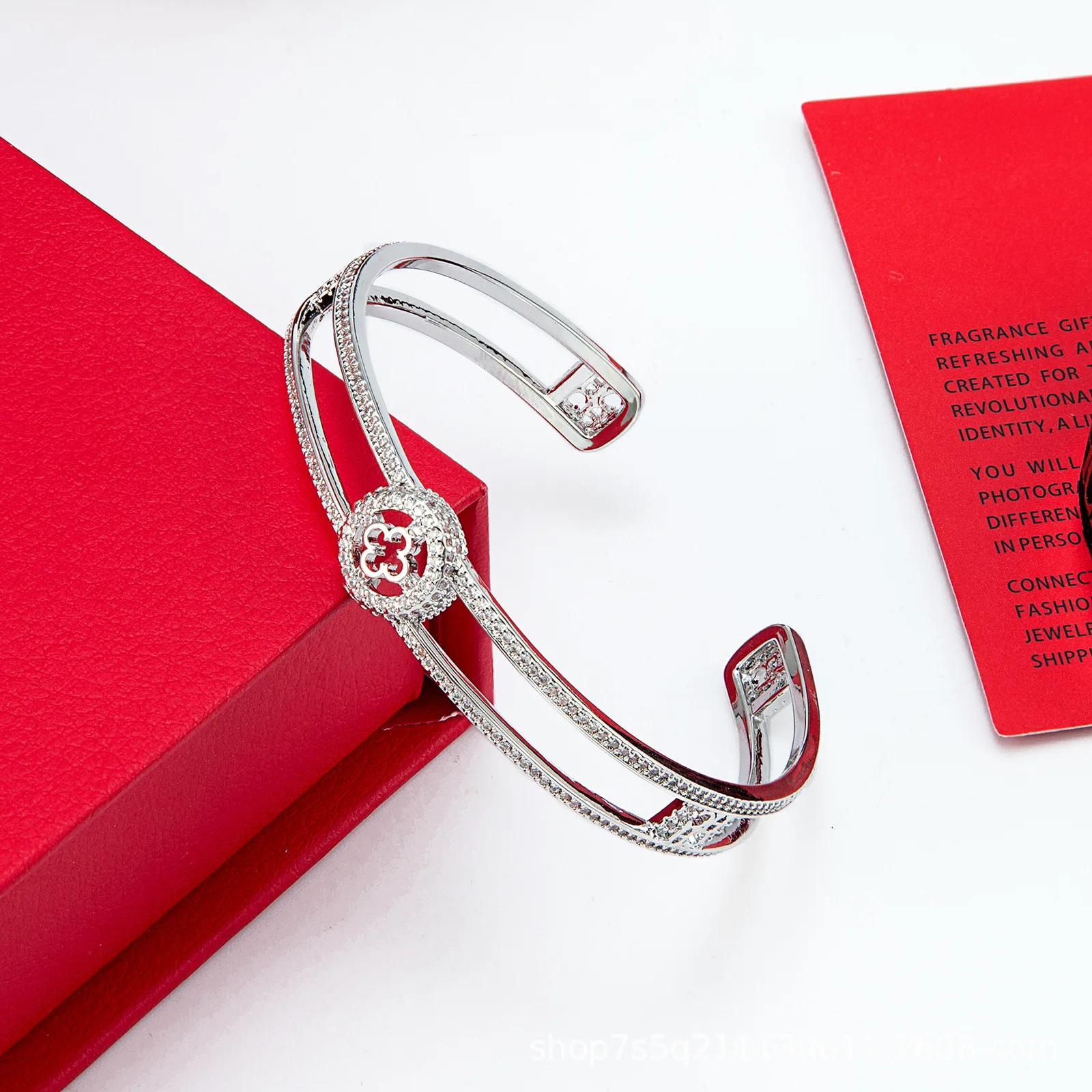 

CH Open Cuff Bracelet with Sparkling Crystal Inlays and Brand Signature Motif Luxury Jewelry for Women