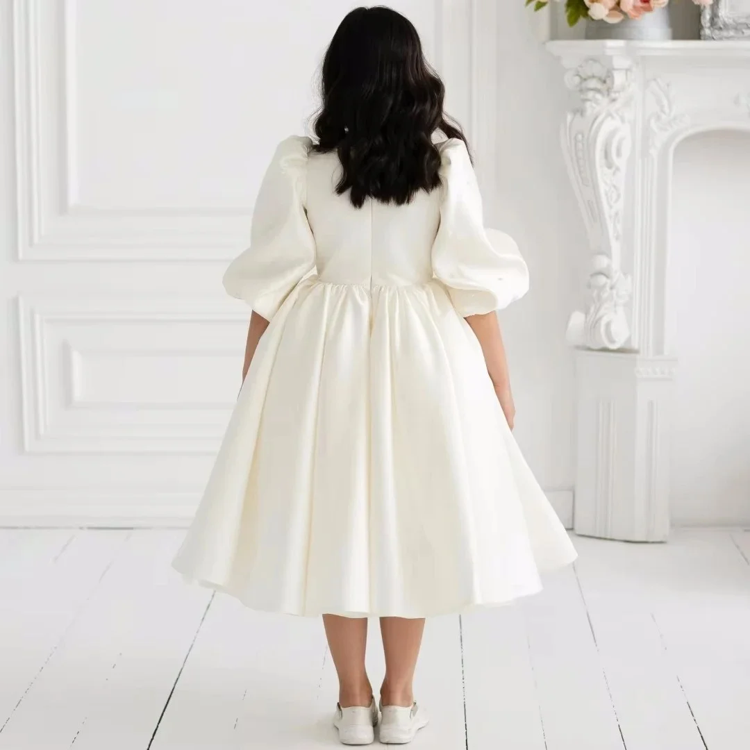 ชุดเดรสเด็กหญิงสีงาช้างแบบสั่งตัด ผ้าซาติน ผ้าทูลล์ ประดับมุก แขนครึ่งแขน สำหรับงานแต่งงาน งานวันเกิด งานประกวด งานเลี้ยง งานรับศีลมหาสนิท