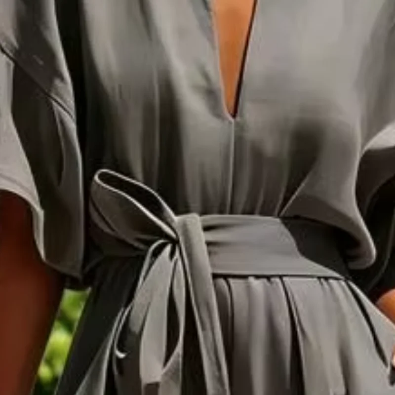 

Women Jumpsuit Short Bell Sleeve Deep V Neck Soft Fabric Wide Leg Rompers Summer Casual One Piece Overall with Pockets
