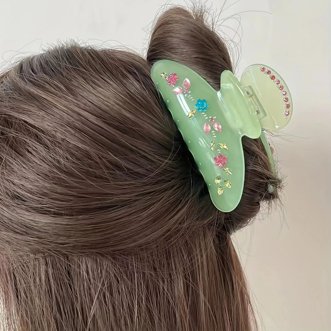 

Luxury-feel green hair clip with delicate floral rhinestone design French-inspired chic ponytail clip