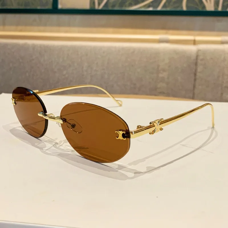 

2025 New Oval Metal Frameless Sunglasses Men's and Women's High-end Retro Fashion Sunscreen Glasses UV400 Shades Eyewear