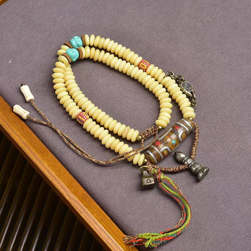 Yak bone 108- Buddhist with beads, multi-loop bracelet, glass agate, and Dzi bead accessories