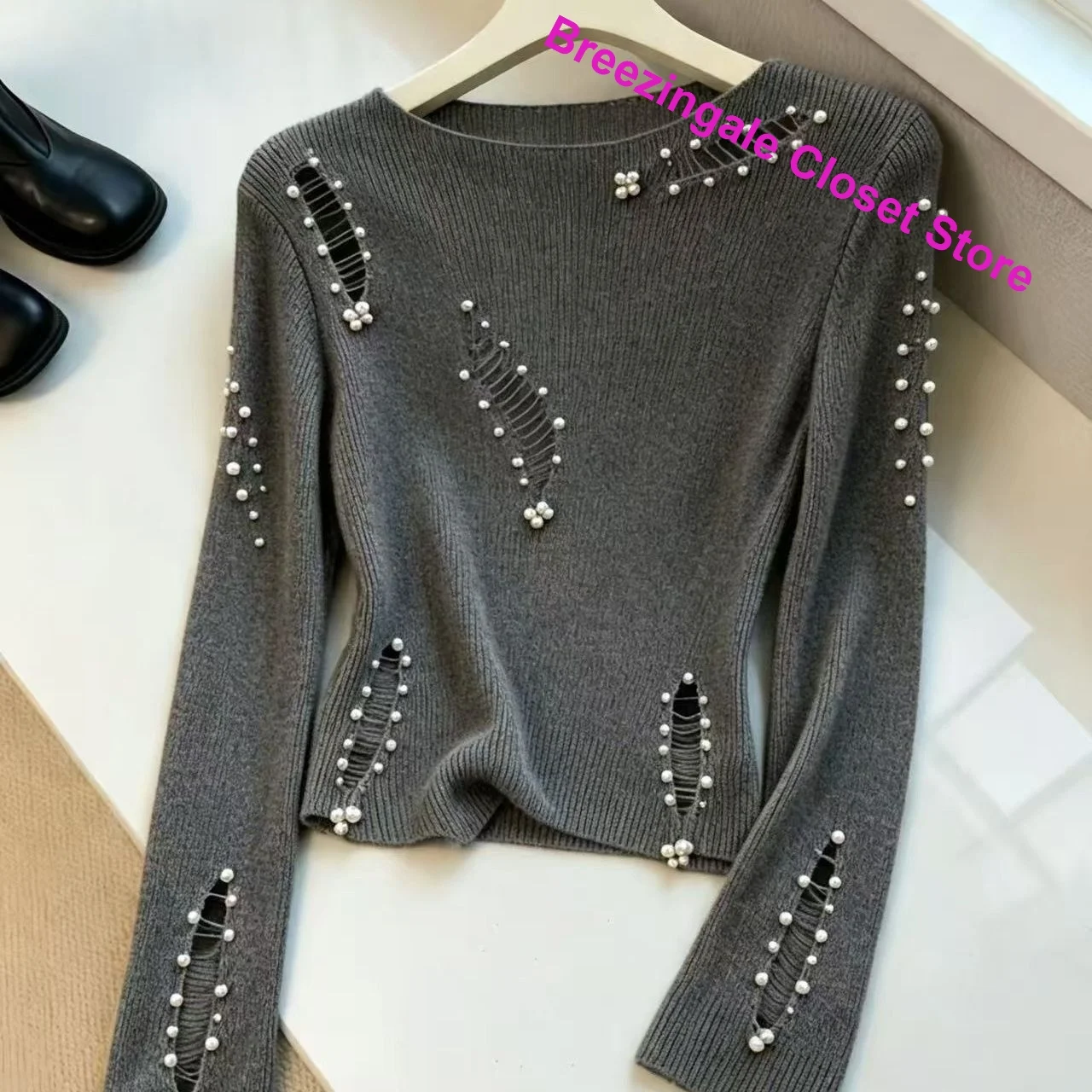 French design sense Pearl hole sweater female autumn and winter new fashion niche hollow long sleeve short casual slim sweater
