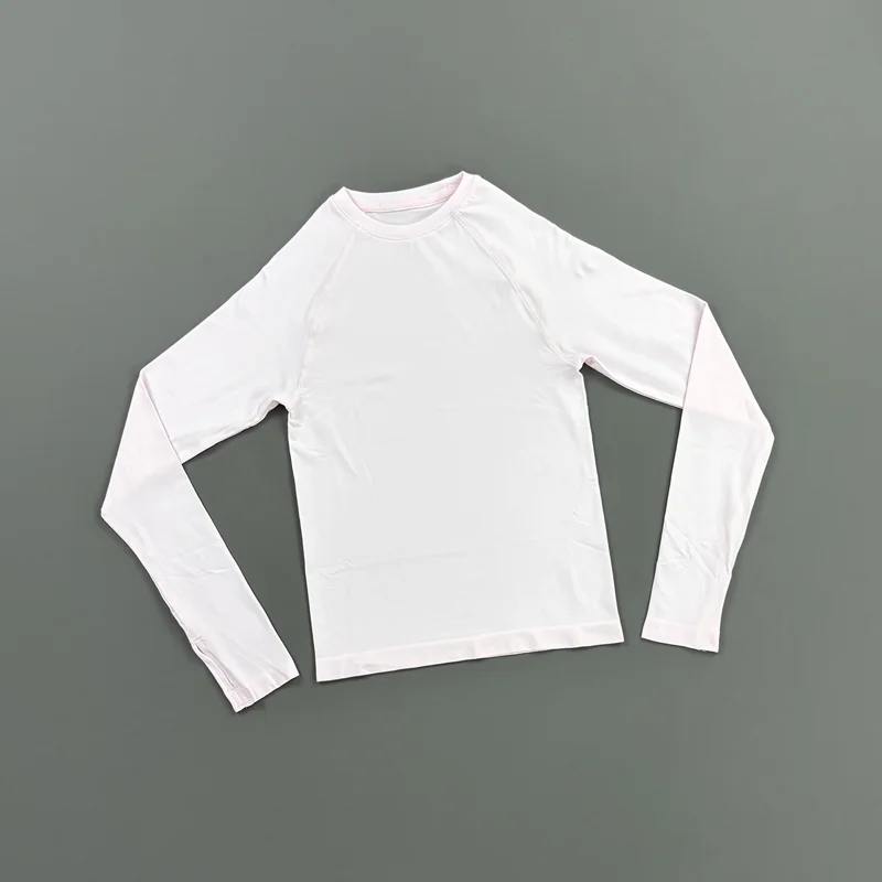 HISTELLO Defy Langarm-Workout-Top für Damen, Nahtloses Gym-Sportshirt mit Daumenlöchern, Slim Fit Sportshirt für Laufen, Yoga und Fitness – Detail 18