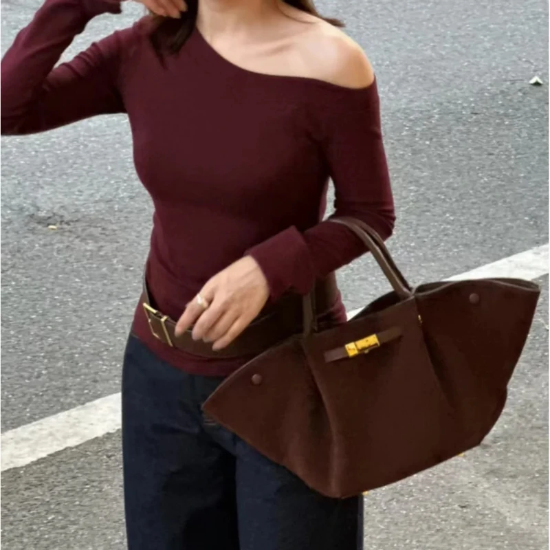 

2026 New Suede Leather Wing Bun Fashion Dumpling Bun Handheld Large Capacity Tote Versatile New York Bag Storage Diagonal Span