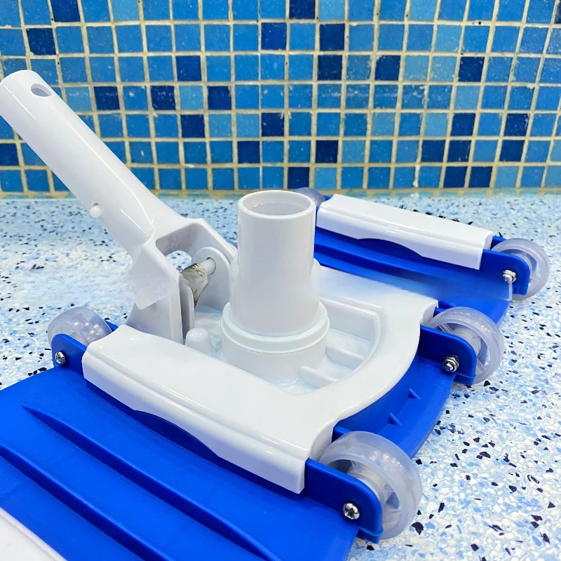 

Pool cleaning brush roller with brush vacuum suction head