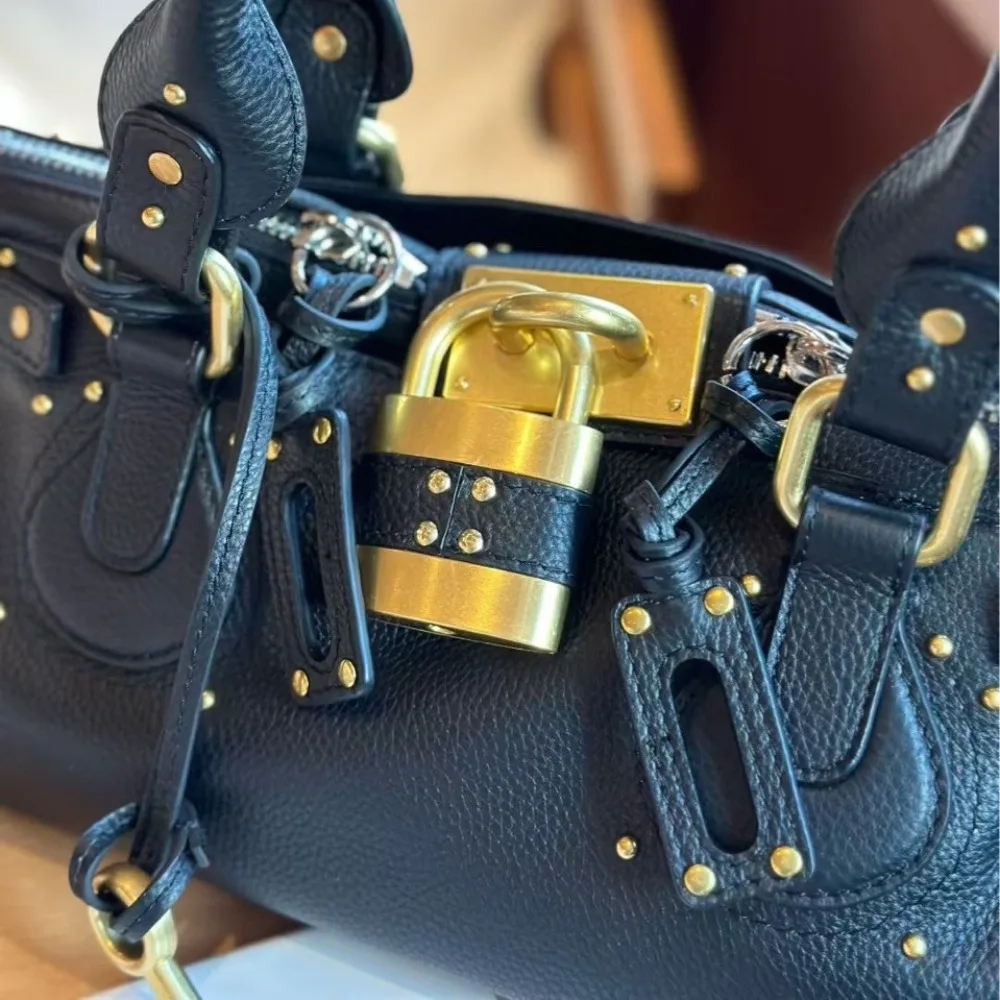 Nicho de cuero de primera calidad, estilo Medieval clásico, nicho Retro, moda versátil, bolso con cerradura antigua, bolso de hombro portátil para axila, tendencia genial