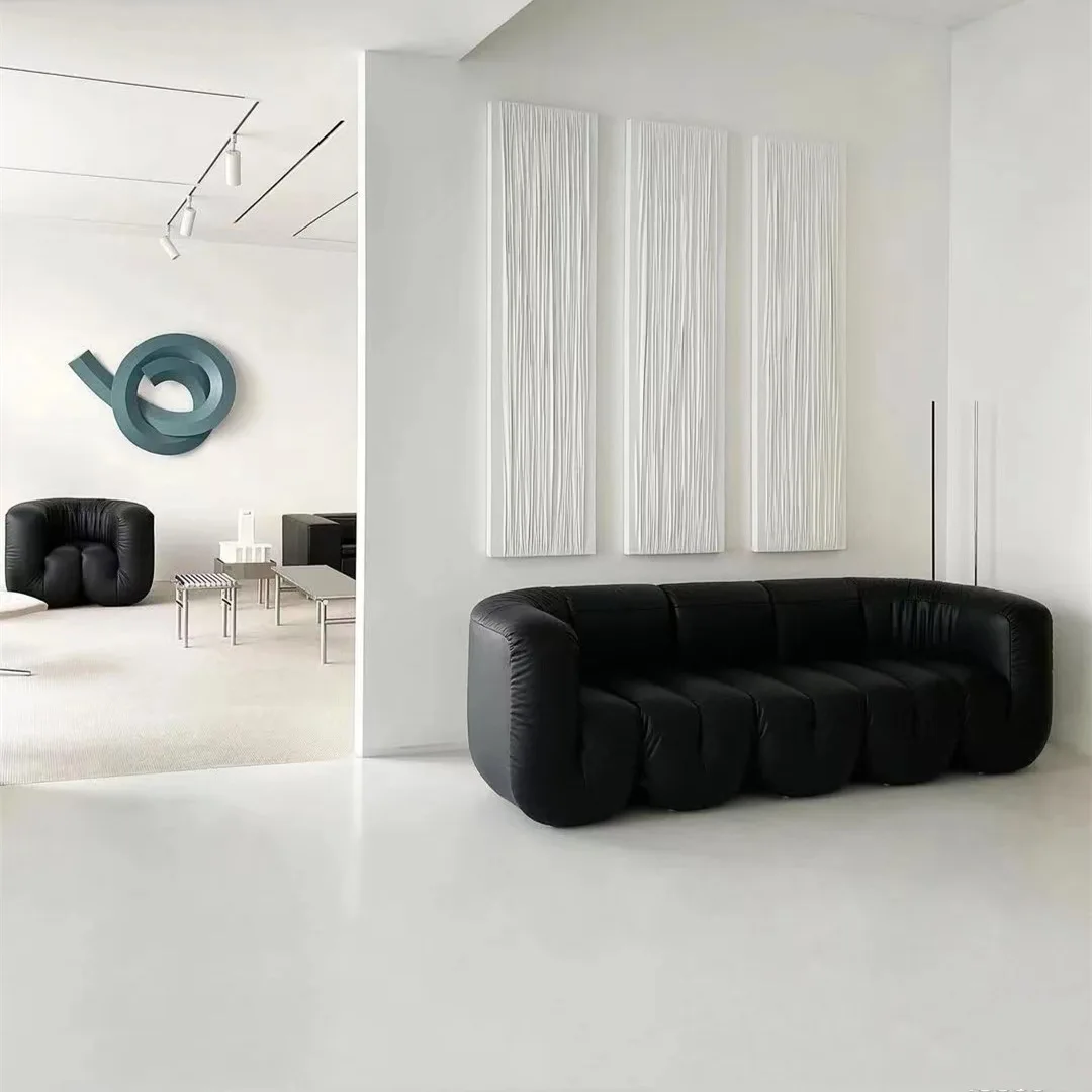 Italian designer bed and breakfast, retro black leather sofa