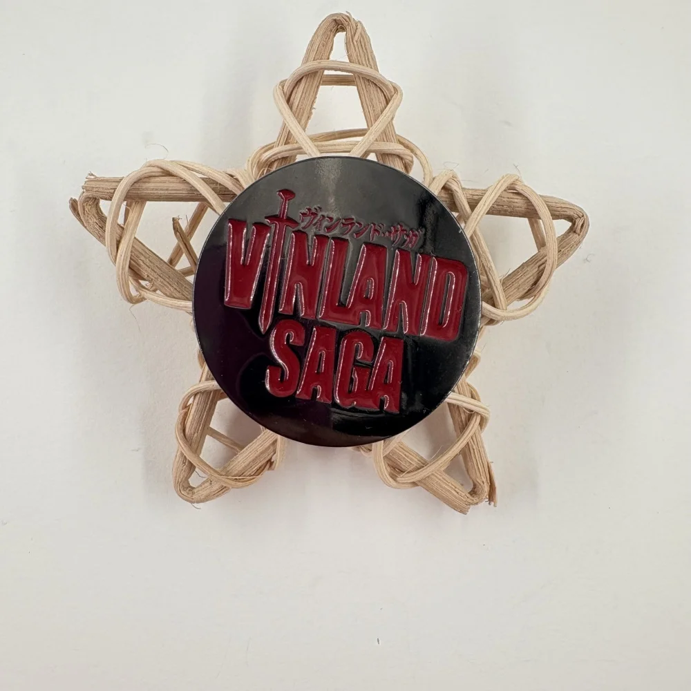 

Japanese anime VINLAND SAGA logo metal pin viking adventure battle warrior lapel pin accessory