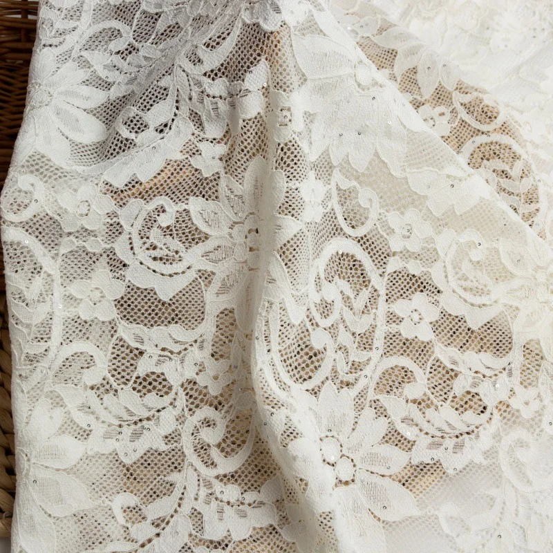 

Latest sequined embroidered floral lace fabric, jacquard embossed mesh fabric, lace fabric for bridal gowns by meter
