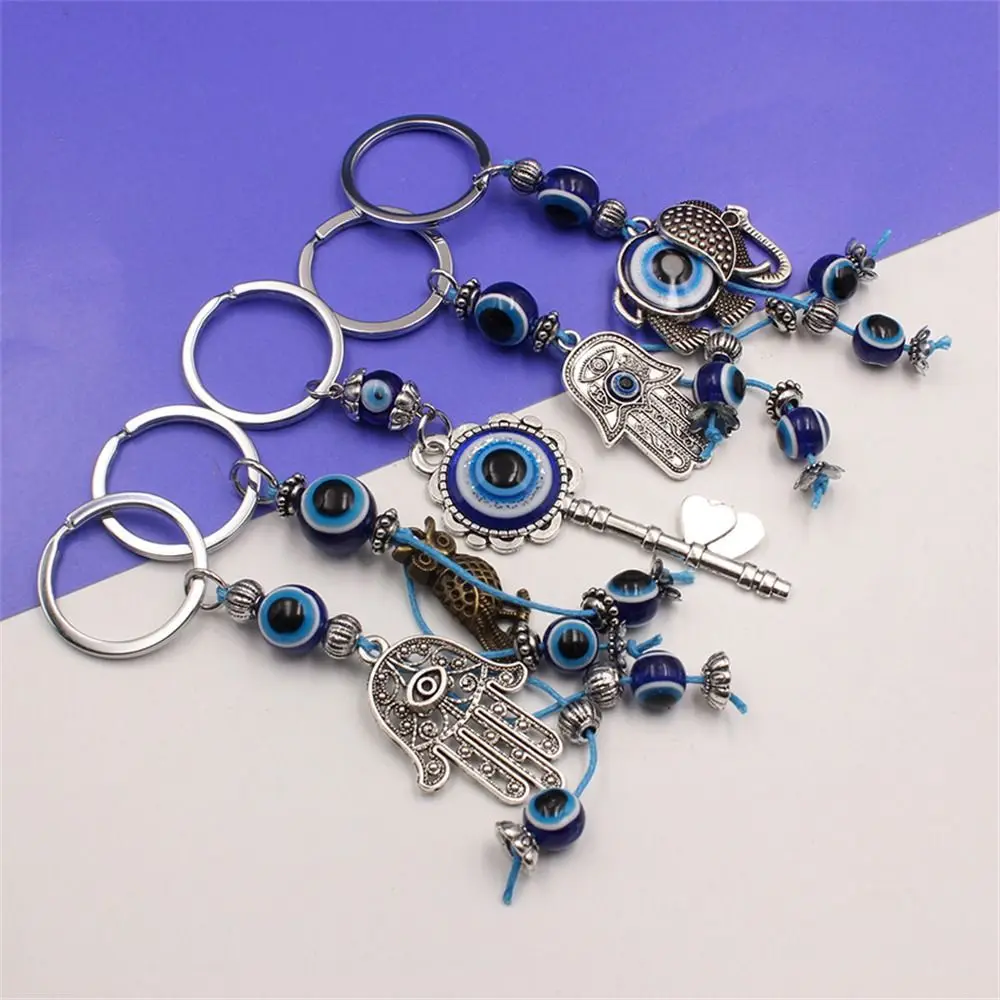 Fashion Blue Color Lucky Eye Keychain Elephant Hasma Hand Evil Eye Keyring Turkish Bag Charm Fatima Hand Pendant Jewelry Gift