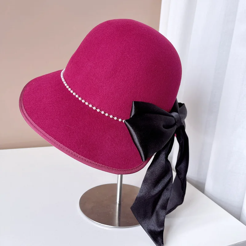 

Stylish and elegant French pearl chain bow streamer back fork basin hat women's large brim wool top hat fisherman's hat