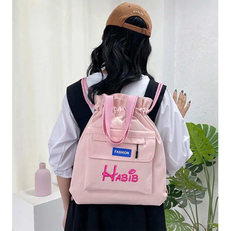 Gepersonaliseerde Damestas 2024 Nieuwe Effen Kleur Bundel Canvas Tas Gepersonaliseerde Kunst Student Klaslokaal Handheld Rugzak