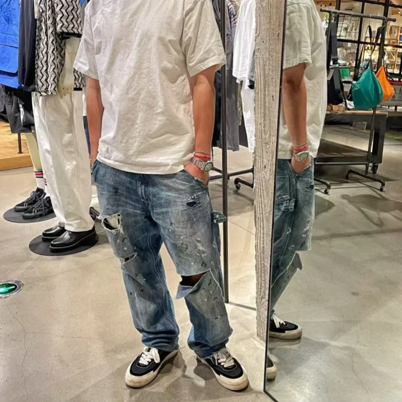 Trendy 2025 Saint Mxxxxxx Denim Pants Long Pants Woodcutting Style Splashed Ink Ripped Jeans Men's Fashion Spring Collection