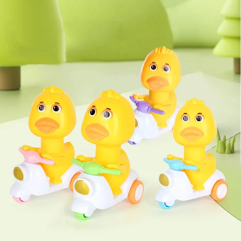 Inertial Car Squeeze Drive Yellow Duck Child Toy 360 ڈگری گھومنے والی کھلونا کار بیبی ونڈ اپ ابتدائی سیکھنے والے کھلونے سالگرہ کا تحفہ