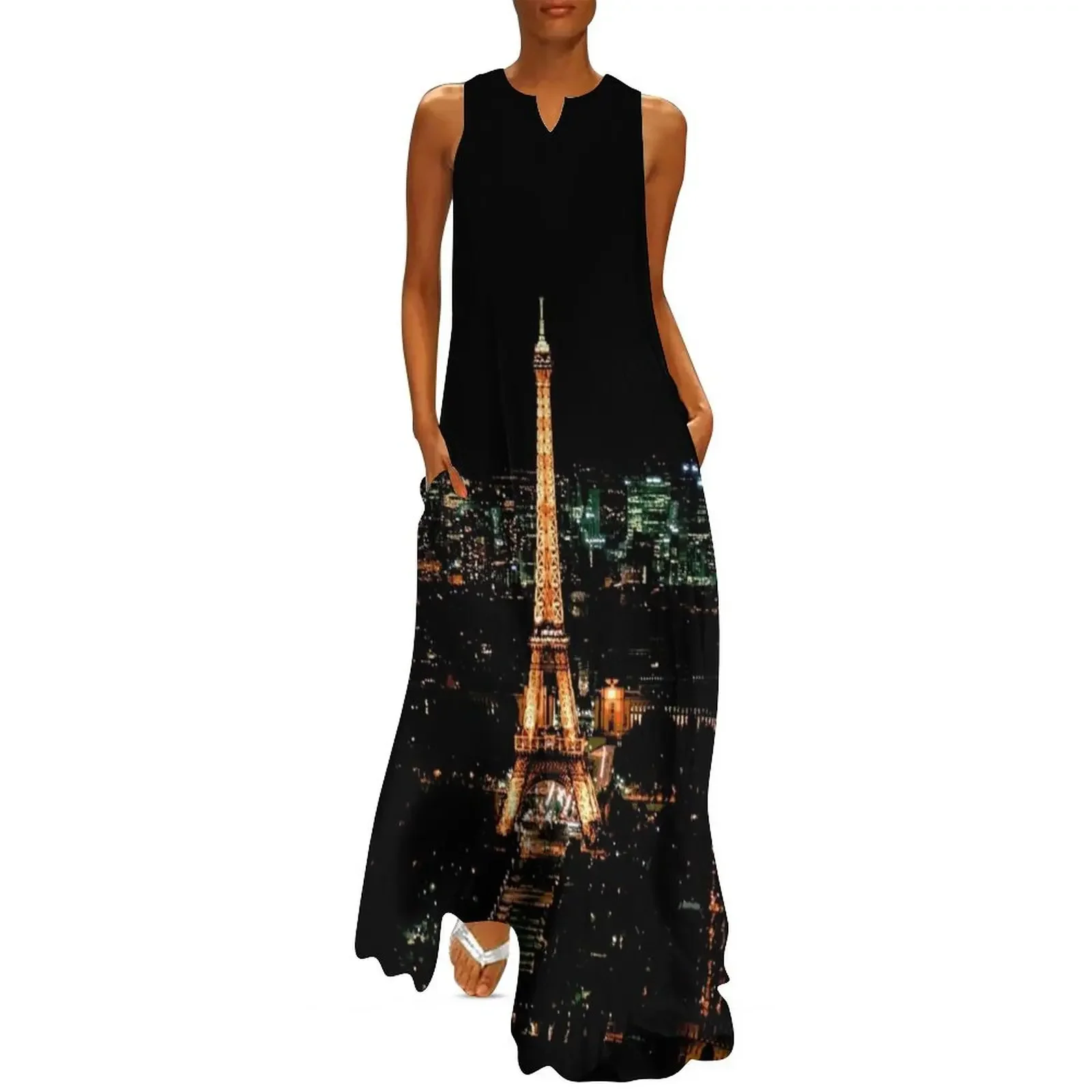 

The Eifel Tower in the night. Les Champs Elisees, Paris, France. Night view of Paris. Long Dress prom clothes Dress