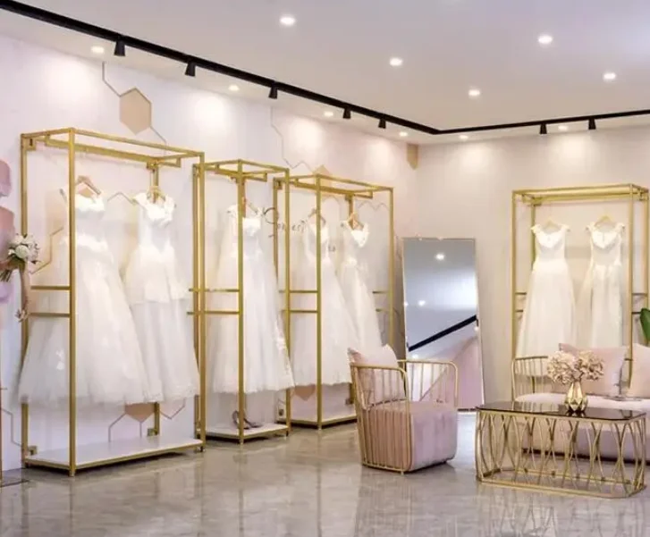 High-end bridal shop display rack, dress rack, golden wedding rack.