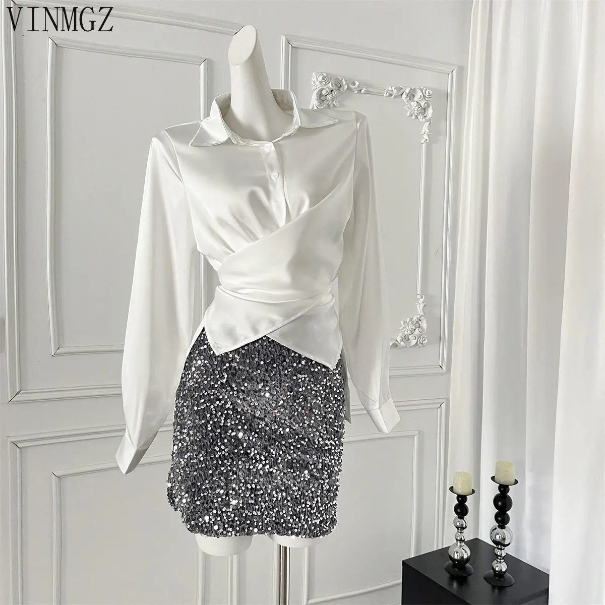lapel irregular long-sleeved shirt women's early autumn design sense cross waist fold chic top tide