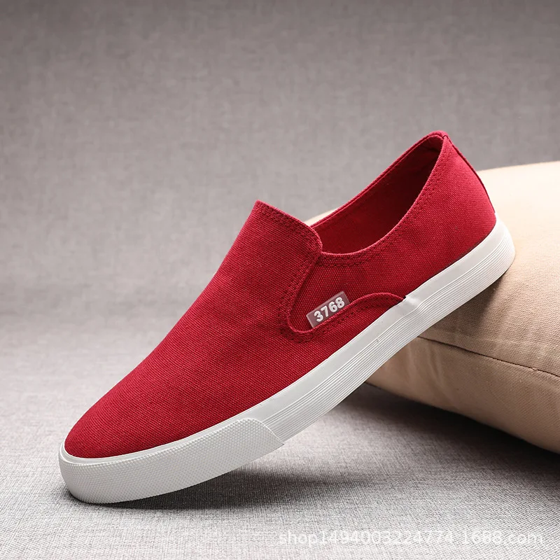 Zapatos de hombre primavera otoño mocasines nuevos zapatillas de deporte de moda hombres lona transpirable de corte bajo Slip-on zapatos casuales de hombre zapatos vulcanizados