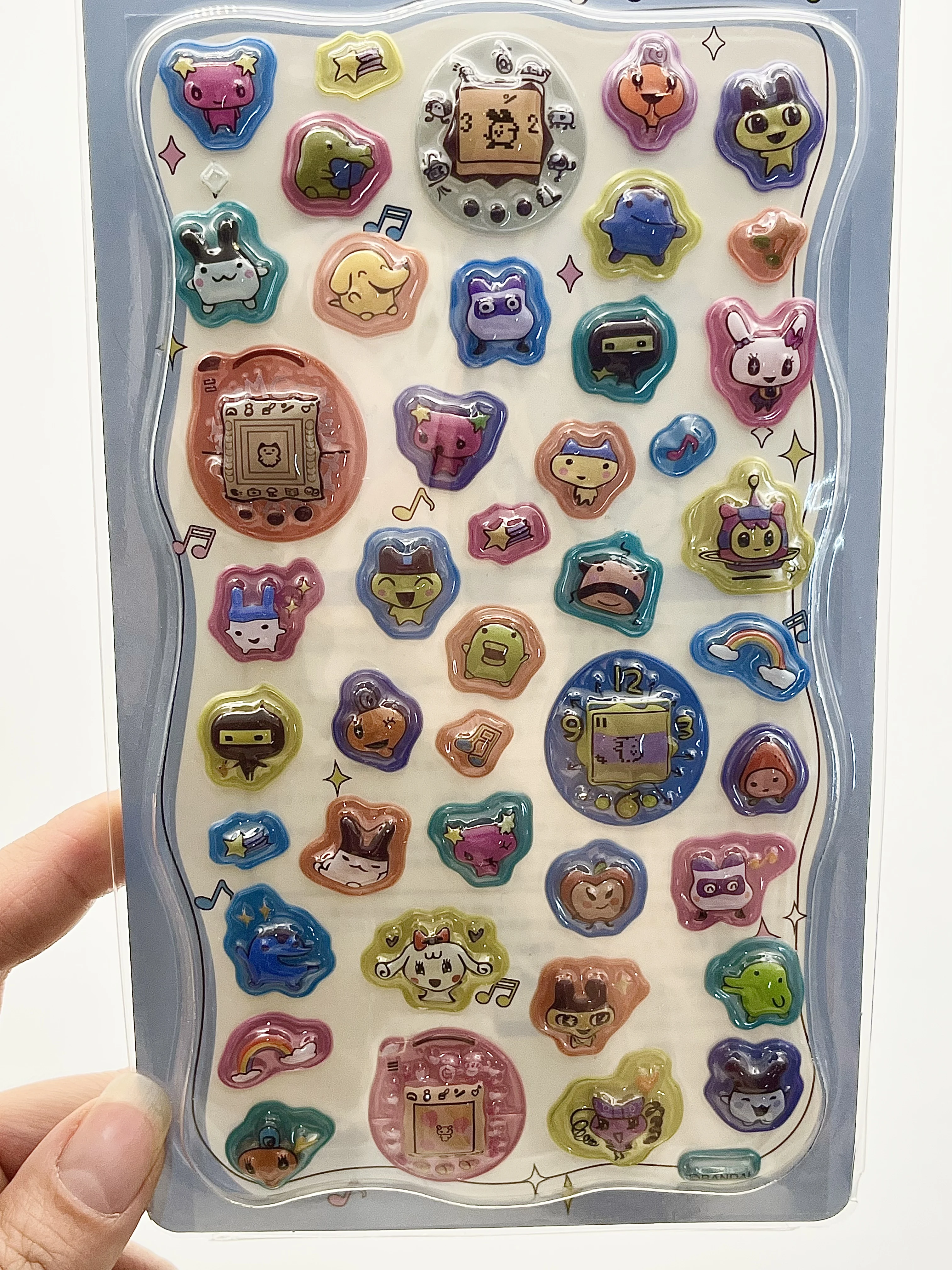 

Новые стильные наклейки Tamagotchi: мультяшные декоративные стикеры, универсальные для DIY, ностальгические, в стиле цифрового питомца, для подарков