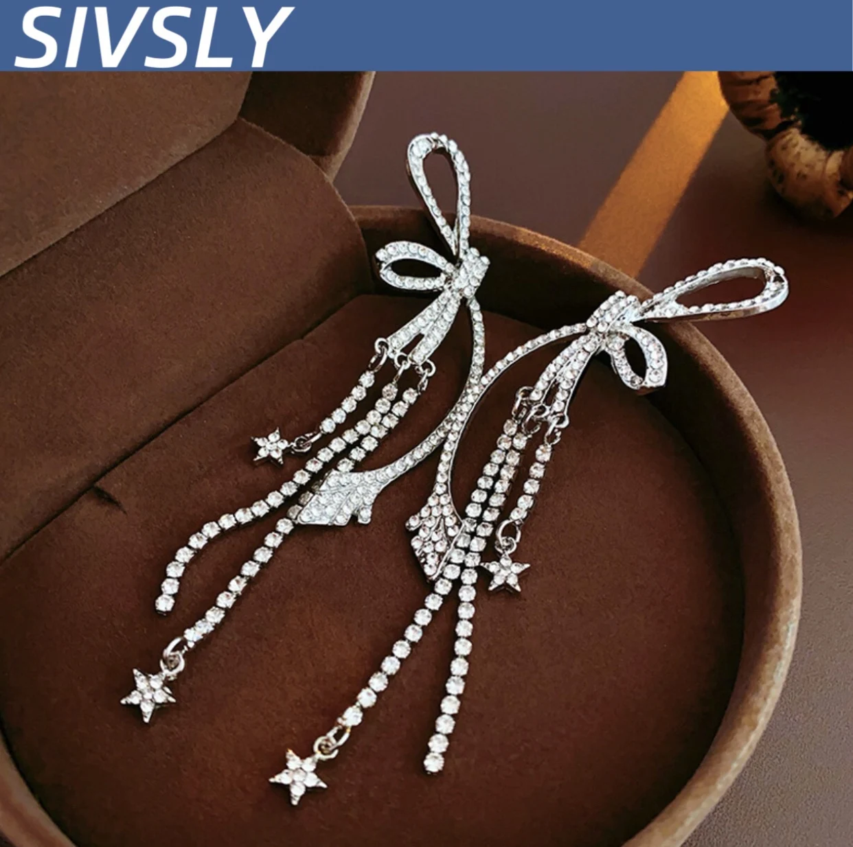 

[Sweet] Luxurious silver needle-set diamond-embellished butterfly-shaped star fringe earrings, high-end, unique, delicate