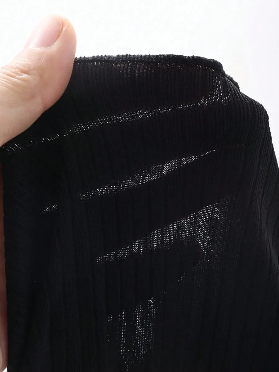 

Women’s Black Ribbed Shorts Featuring Asymmetrical Wavy Hem Design