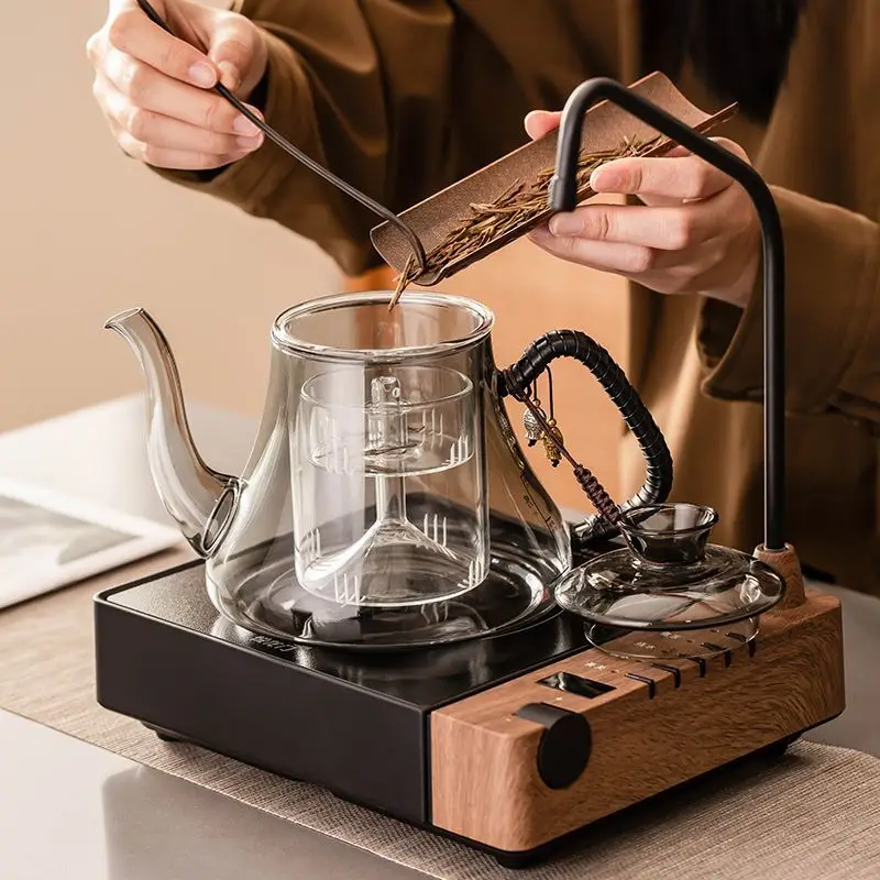 Electric ceramic stove, tea maker, kettle, a complete set of pumped cooking teapot glass tea set in household and indoor.