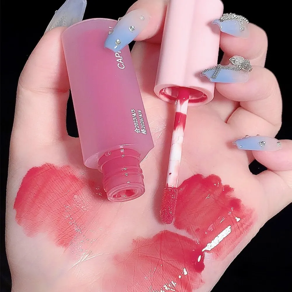 Cap puvini rosa Liebe Herz Design Lippen glasur Spiegel Wasser Licht Glas transparenten Lip gloss feuchtigkeit spendenden weiblichen niedlichen Lippenstift