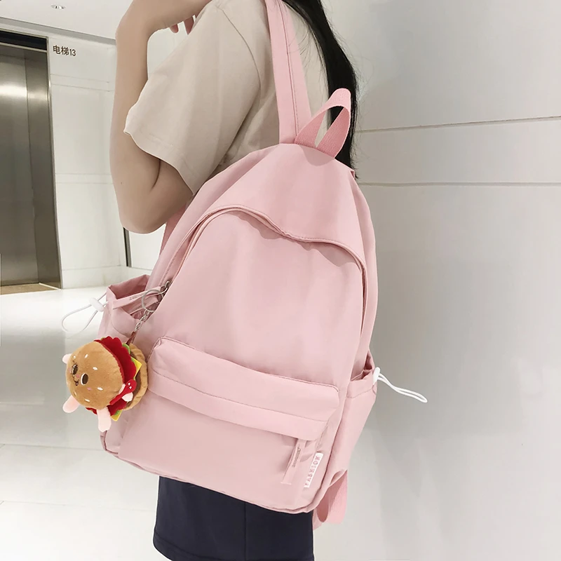 Modny tornister dla nastoletnich wodoodpornych nylonowych dziewcząt Bagpack śliczne damskie plecaki na laptopa torba podróżna czarny różowy Bookbag unisex