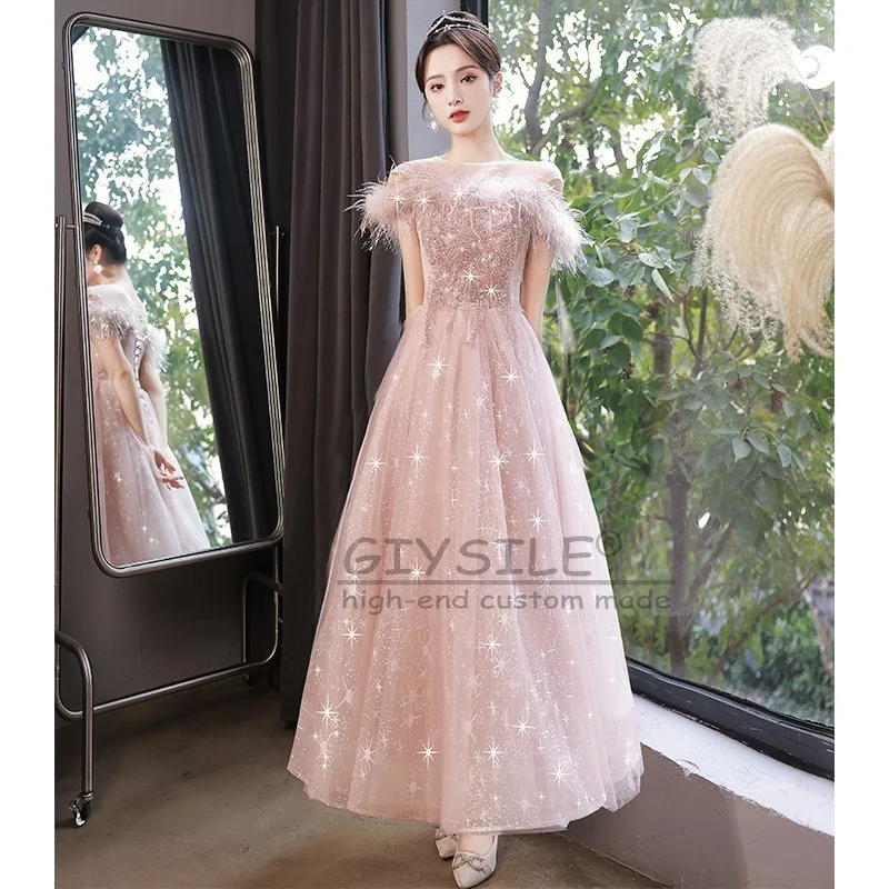 GIYSILE カスタマイズされたピンクのスパンコールフェザーイブニングドレス女性 2025 新ファッションプリンセスパーティー A ラインストラップバックショルダークランプ