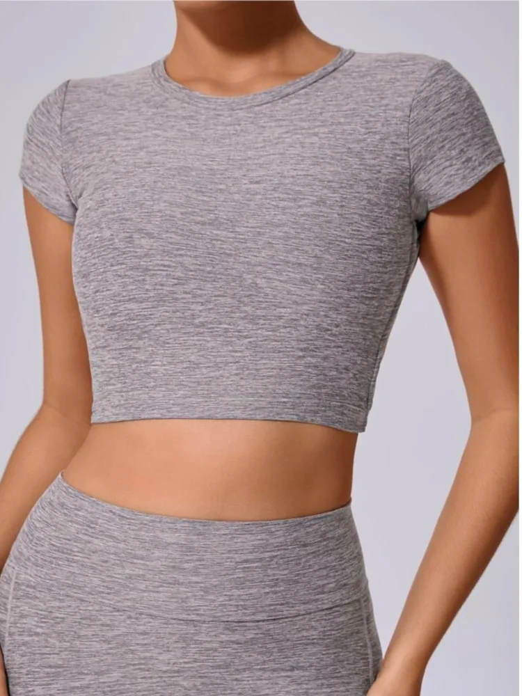 T-shirt sportiva slim da donna stile semplice estate nuovo allenamento traspirante senza schienale maniche corte top femminili tuta comfort casual