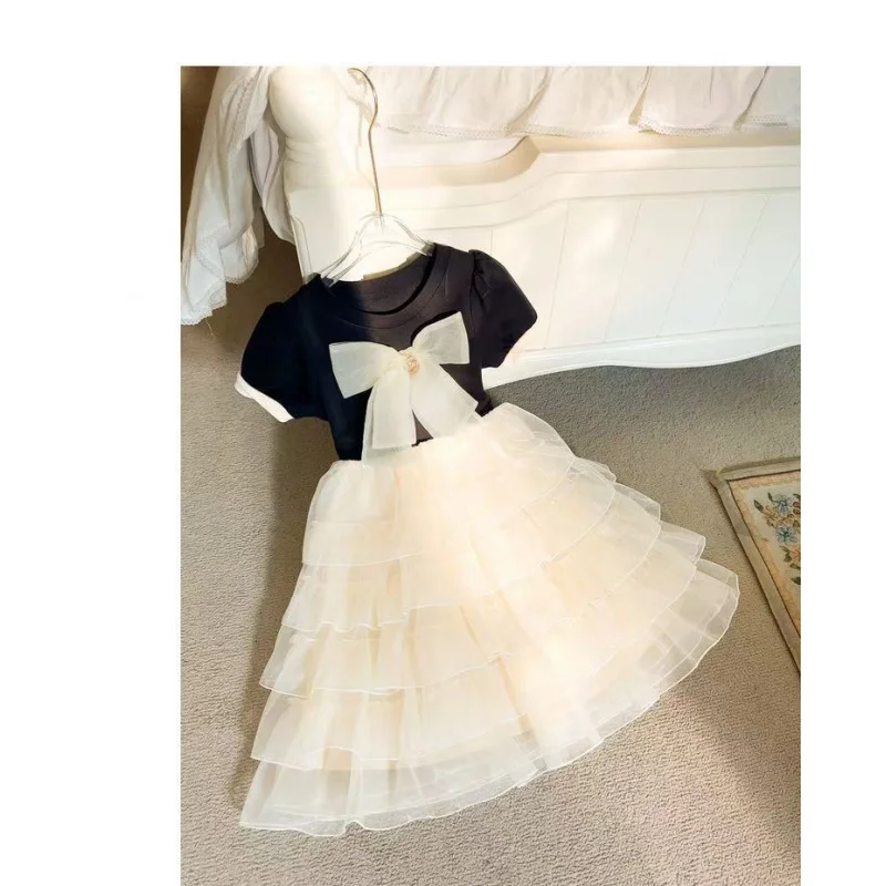 فستان بناتي بأكمام قصيرة مع فيونكة وحاشية ملفوفة فستان كعكة الأميرة