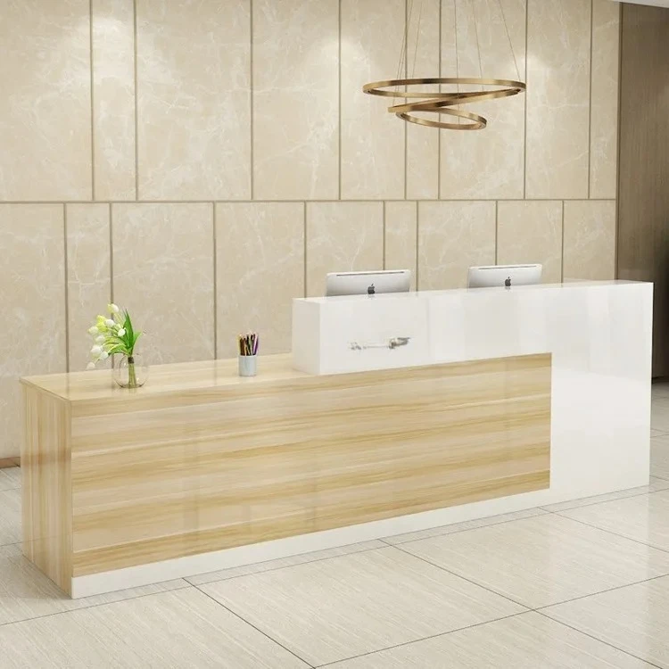 A cashier counter is simple and modern, and the beauty salon information desk is painted.