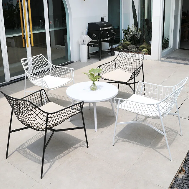 Balcony outdoor table and chair combination, outdoor iron hollowed out small coffee table, simple leisure