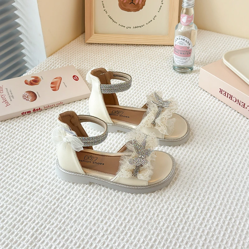 

Kids Sandals for Girls New Summer Rhinestone Bowknot Kids Casual Shoes Wedding Party Versatile Children's Fashion Flat Sandals