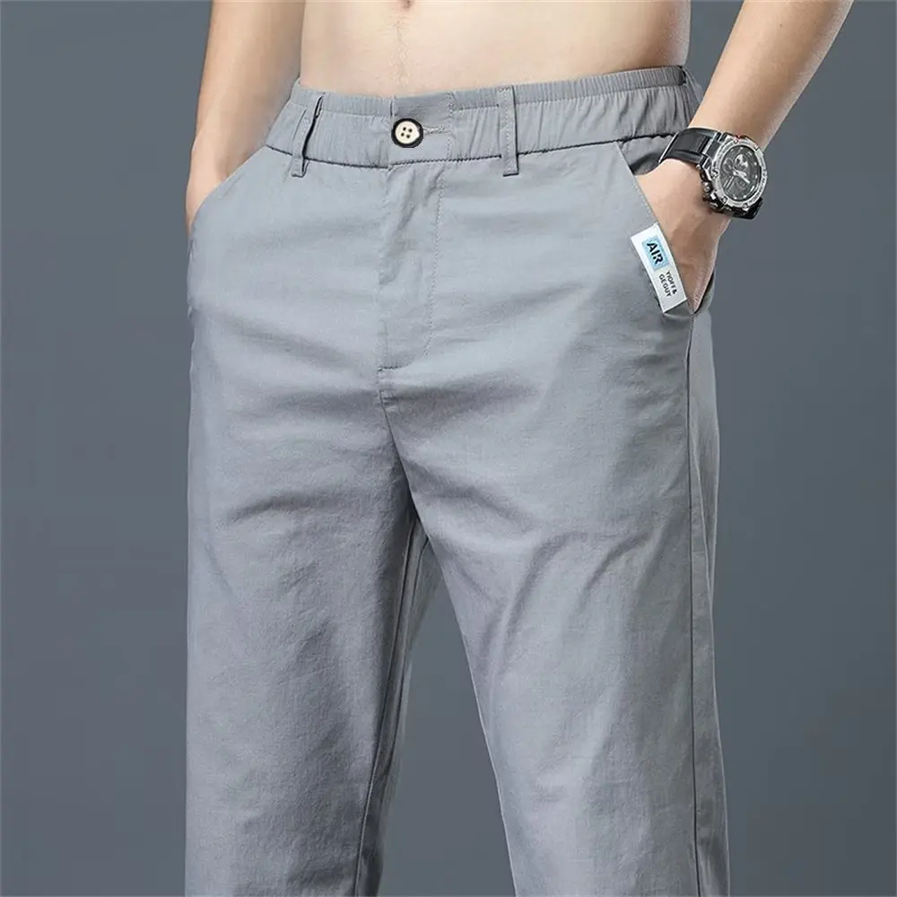 بنطلون رجالي صيفي طويل فضفاض مستقيم بخصر مطاطي من الحرير الجليدي سريع الجفاف بدون كي مريح وقابل للتنفس