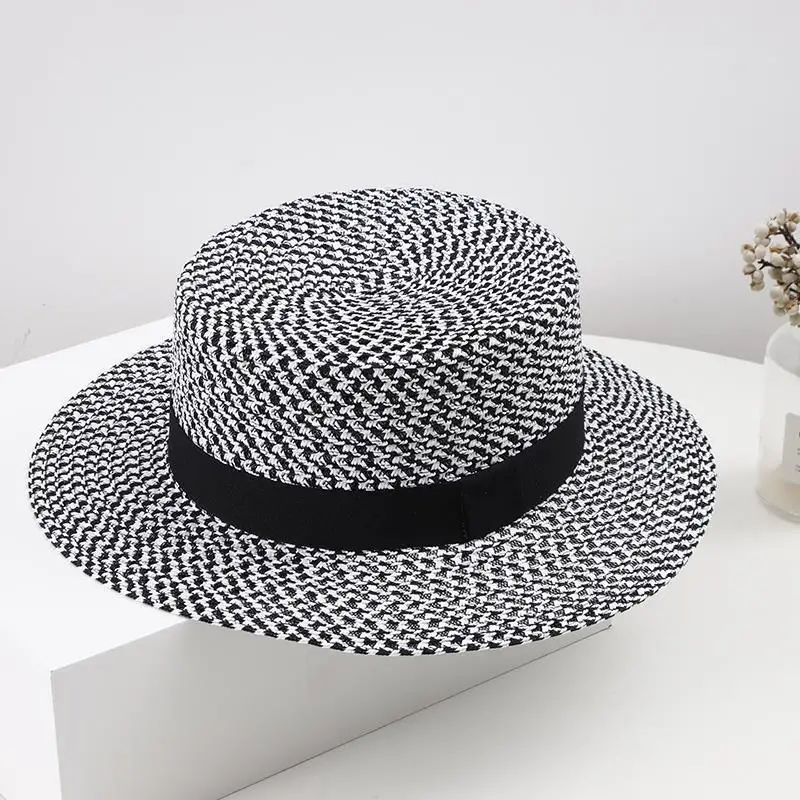 Topi Hitam dan Putih Topi Jerami Tenun Berongga Sejuk Retro Inggris Musim Panas Wanita Topi Liburan Perjalanan Tabir Surya Kerai Tepi Laut