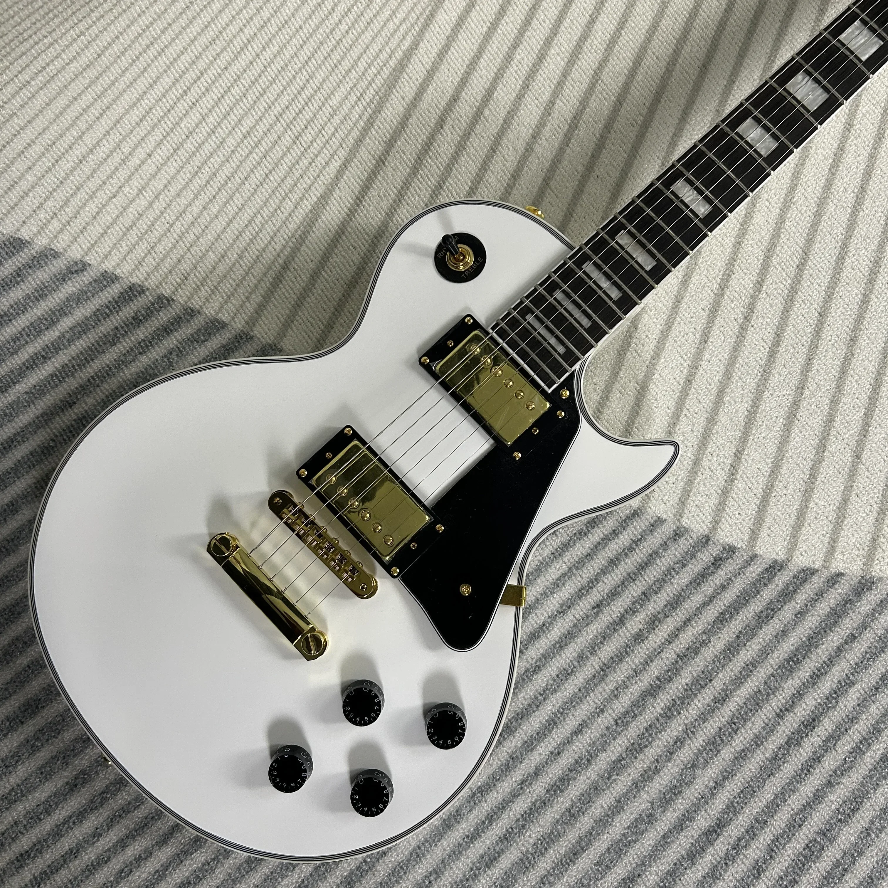 

Custom Electric Guitar, Mahogany Body, Rosewood Fretboard, Golden Hardware, Tune-O-Matic Bridge, White Color, Free Ship, Gleeson