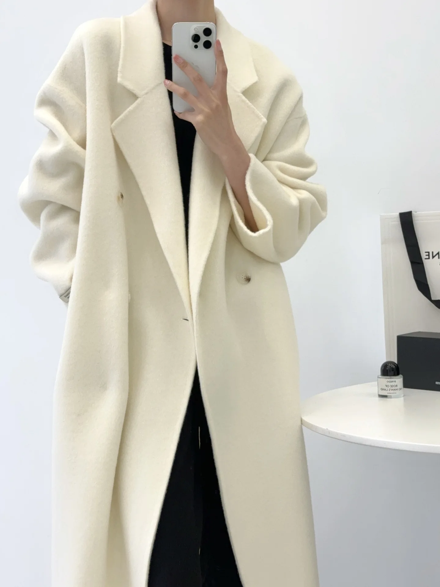 Autumn and winter women\'s casual solid color lapel long sleeved loose long coat