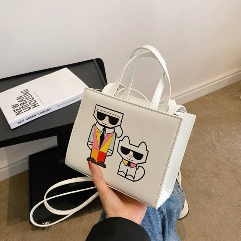 2025 Nuova borsa tote in tela Borsa a tracolla semplice Borsa da pranzo portatile Borsa da donna portatile di grande capacità