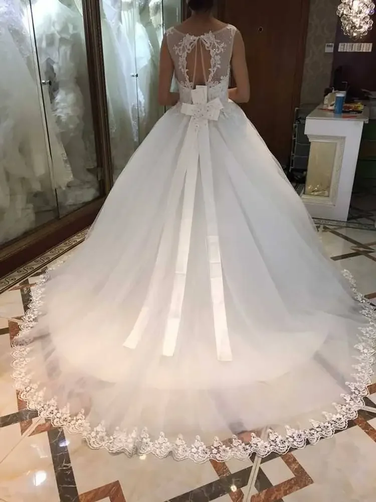 Apliques personalizados con cuentas Línea A Vestidos De Novia Vestidos De Novia tren De barrido espalda abierta Vestidos De Novia De talla grande con lazo